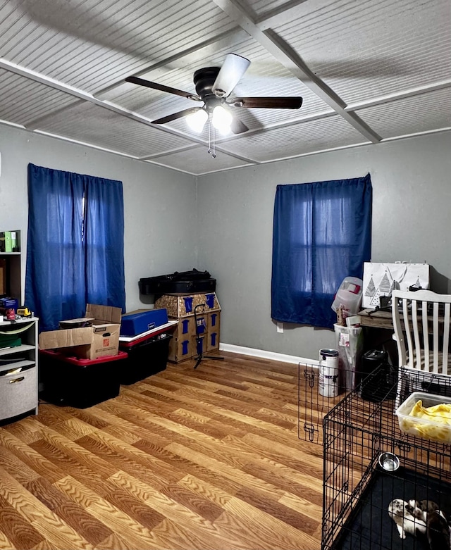 interior space featuring hardwood / wood-style floors and ceiling fan