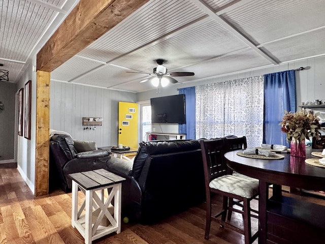 living room featuring hardwood / wood-style flooring and ceiling fan