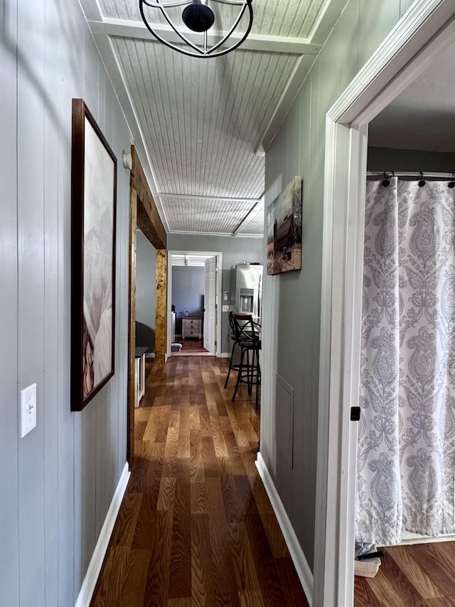 hall with dark hardwood / wood-style flooring