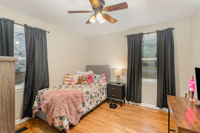 bedroom featuring ceiling fan and light wood-type flooring