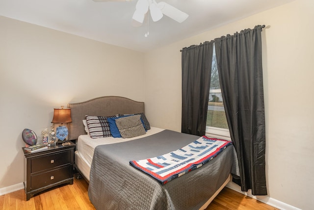 bedroom featuring ceiling fan and light hardwood / wood-style flooring