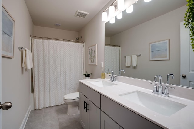 full bathroom featuring shower / tub combo, vanity, toilet, and tile patterned flooring