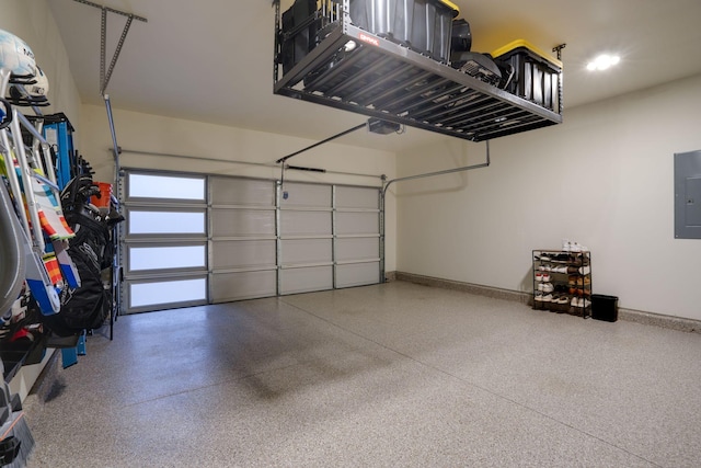 garage with a garage door opener and electric panel