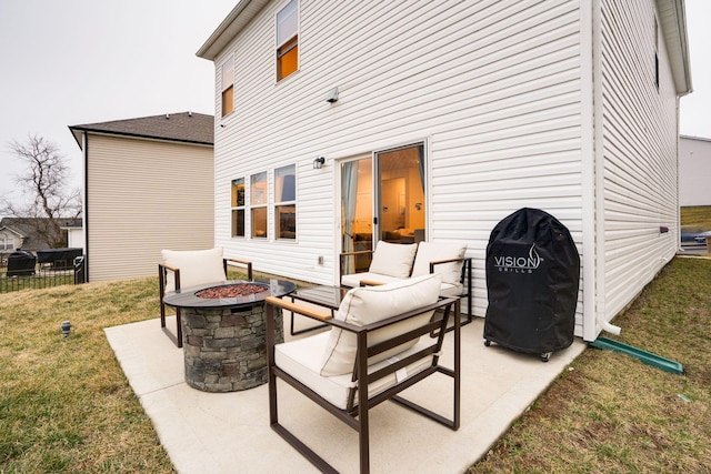 view of patio with a fire pit