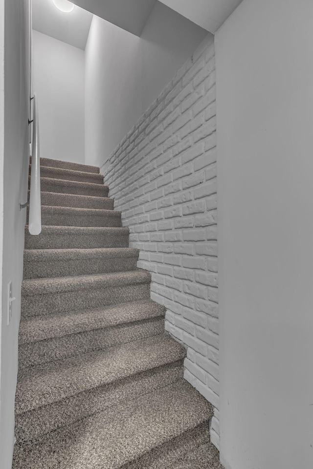 stairs with brick wall