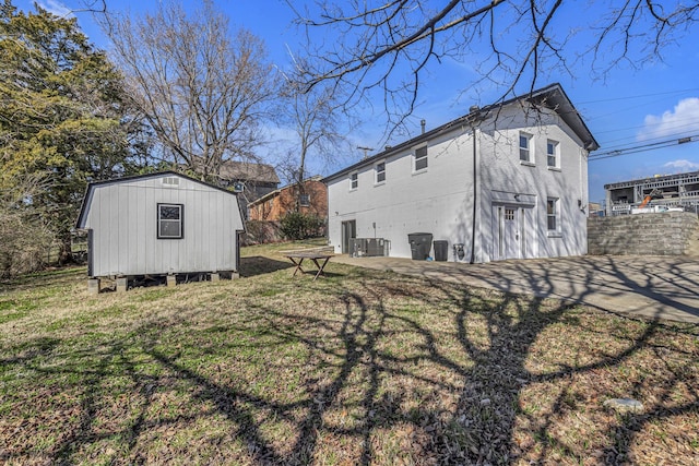 exterior space with central AC and an outdoor structure