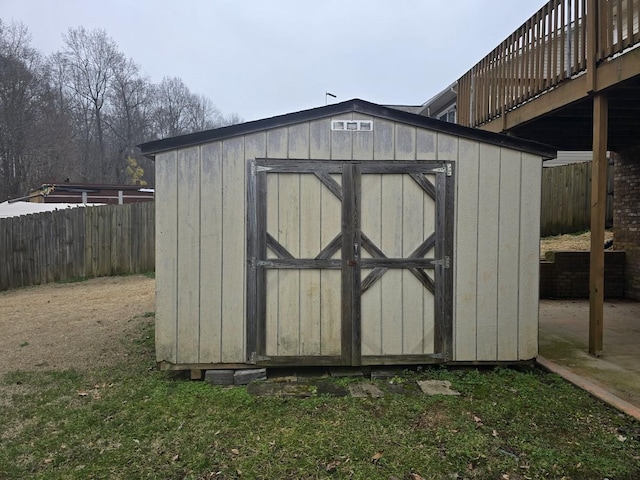 view of outdoor structure featuring a lawn