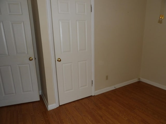 interior space featuring dark wood-type flooring