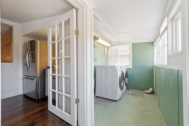 washroom featuring washer / dryer and dark wood-type flooring