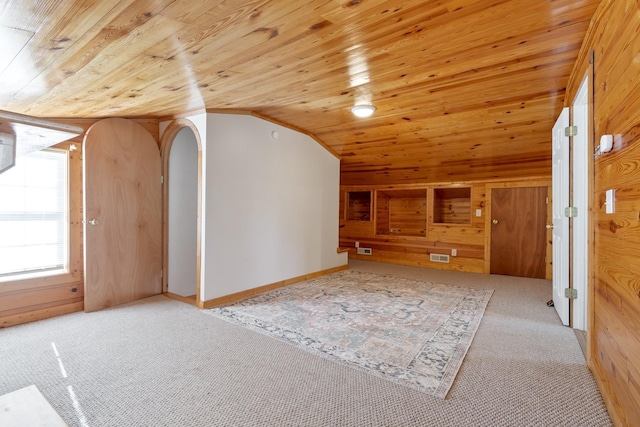 bonus room featuring light colored carpet, lofted ceiling, and wooden ceiling