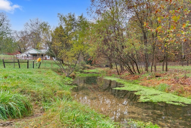 view of yard with a water view