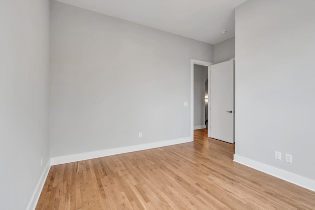 spare room with light wood-type flooring