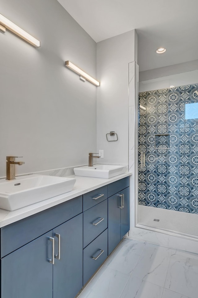 bathroom with vanity and walk in shower