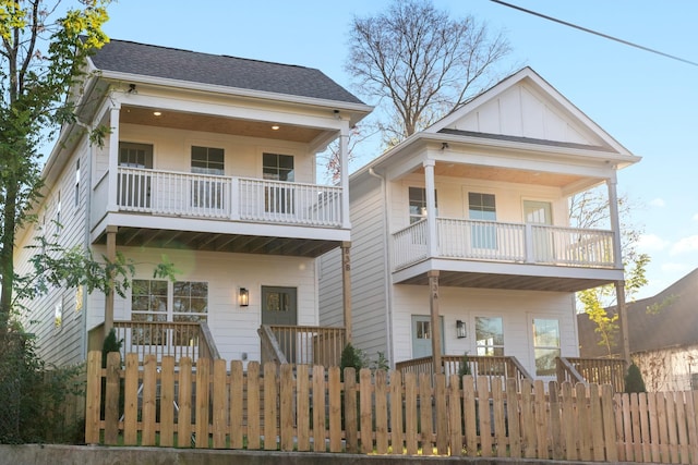 view of front of house featuring a balcony and covered porch