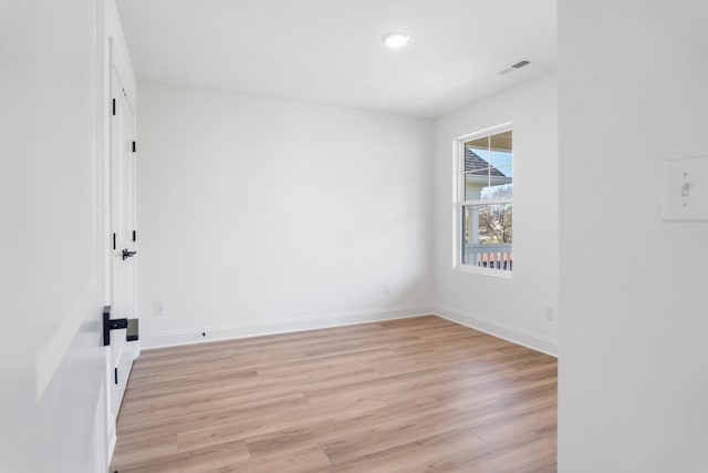 empty room featuring light hardwood / wood-style floors