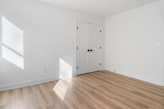 empty room featuring light hardwood / wood-style floors