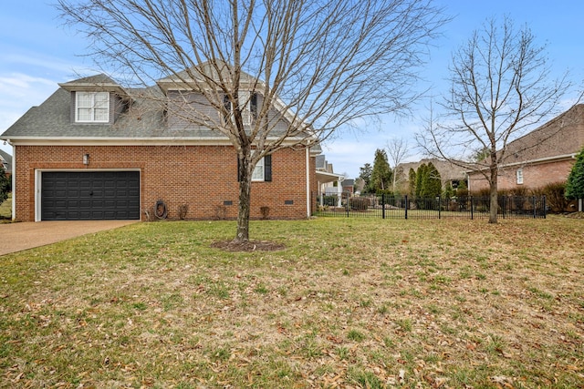 view of side of home with a garage and a yard