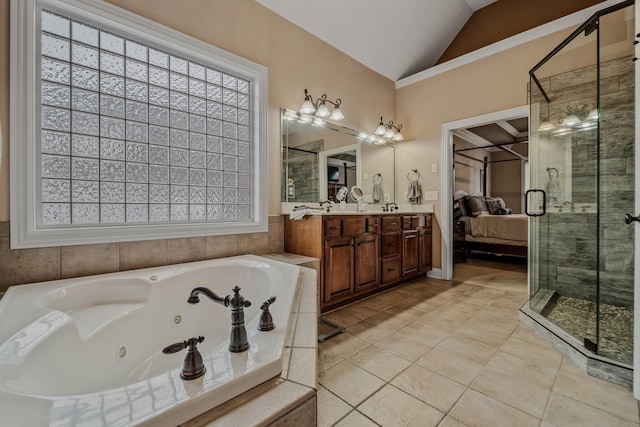 bathroom featuring vanity, tile patterned flooring, vaulted ceiling, and separate shower and tub