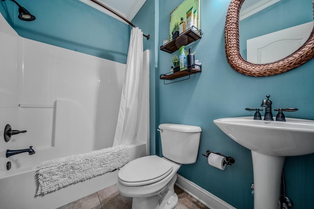 full bathroom with sink, tile patterned floors, toilet, and shower / tub combo