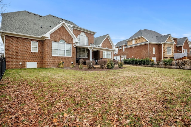 view of front facade featuring a patio and a front lawn