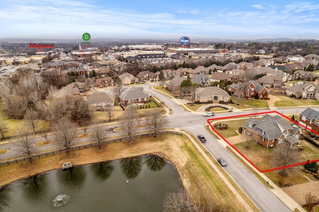 drone / aerial view featuring a water view