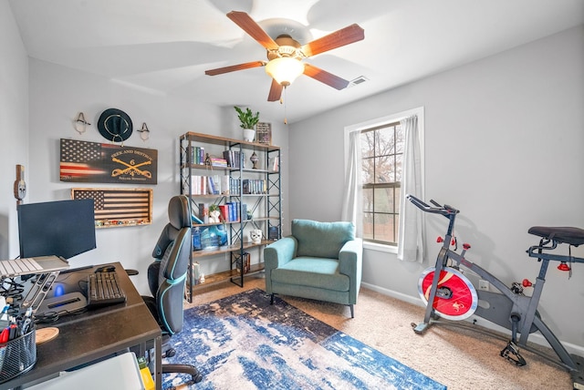 office featuring ceiling fan and carpet