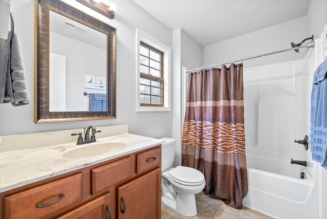 full bathroom featuring shower / tub combo, vanity, tile patterned flooring, and toilet