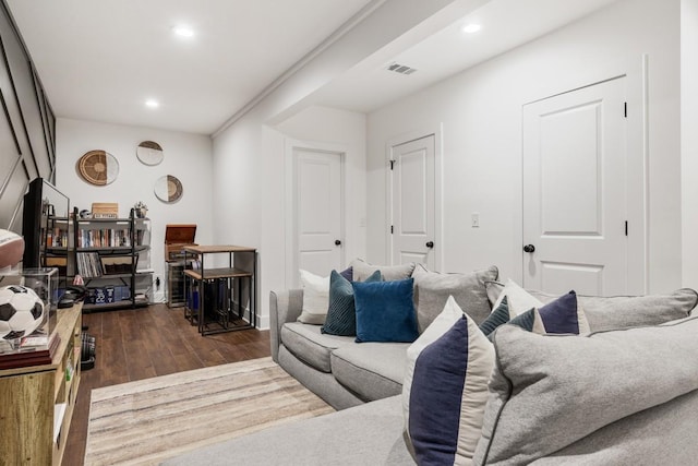 living room with dark hardwood / wood-style flooring