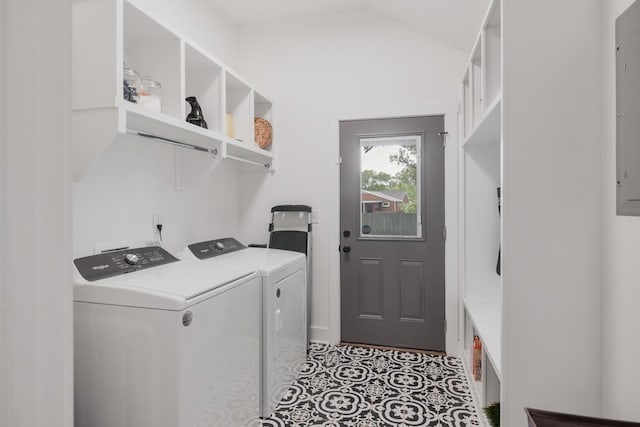 washroom with independent washer and dryer and light tile patterned floors