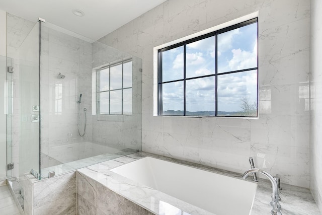 bathroom featuring plus walk in shower