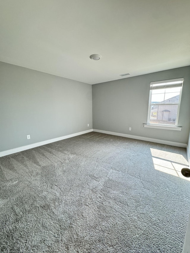 empty room featuring carpet