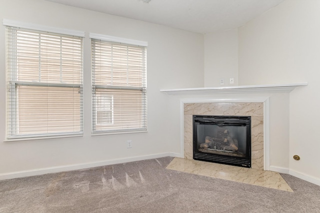 details featuring a fireplace and carpet