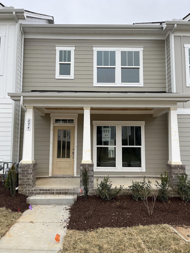 entrance to property with covered porch