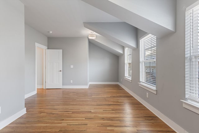 bonus room with light hardwood / wood-style floors