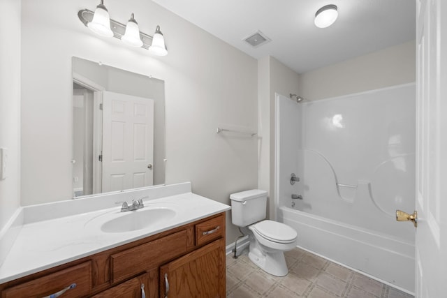 bathroom featuring toilet, visible vents,  shower combination, and vanity