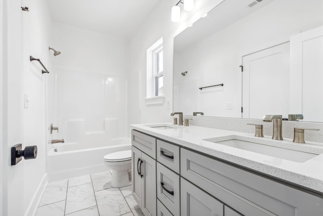 full bathroom with toilet, vanity, and bathtub / shower combination