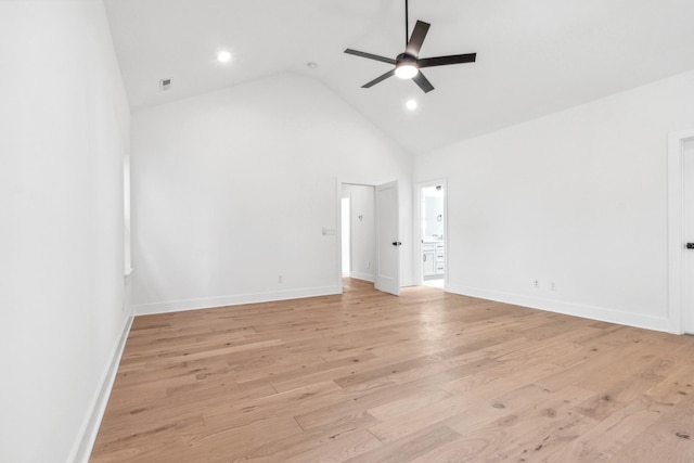 unfurnished room with high vaulted ceiling, ceiling fan, and light hardwood / wood-style flooring