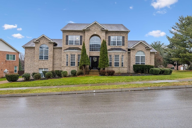 view of front of property with a front lawn