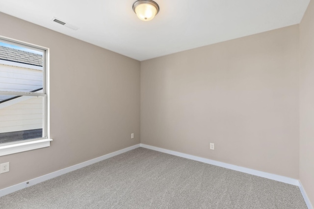 view of carpeted spare room