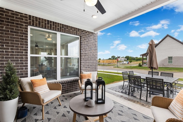 view of patio featuring ceiling fan