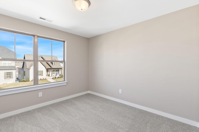 view of carpeted spare room