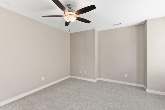 carpeted empty room with ceiling fan