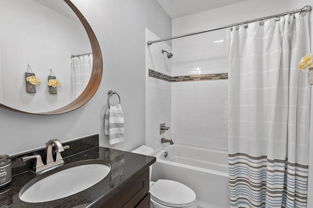 full bathroom with vanity, toilet, and shower / bath combo with shower curtain