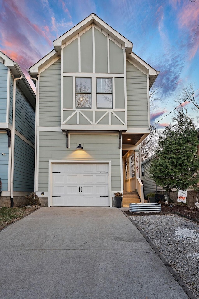 view of front of property with a garage