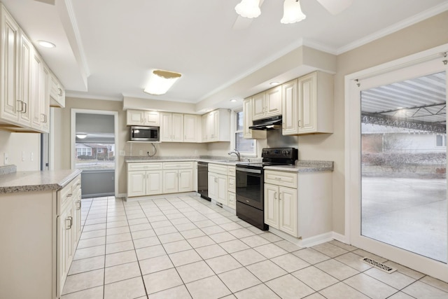 kitchen with sink, ornamental molding, black appliances, and light tile patterned flooring