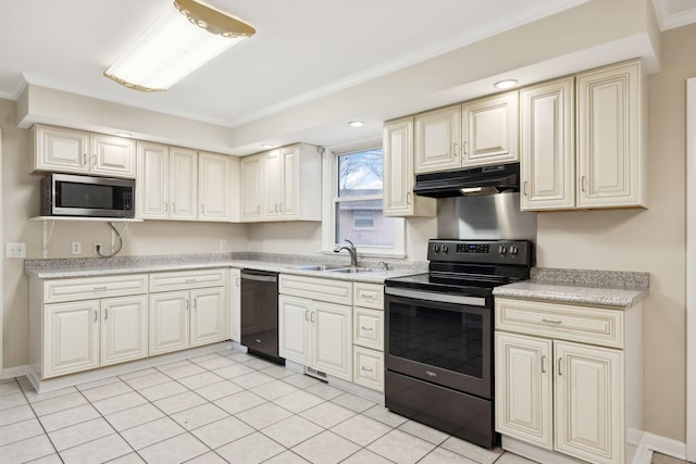 kitchen with sink, light tile patterned floors, ornamental molding, appliances with stainless steel finishes, and cream cabinetry