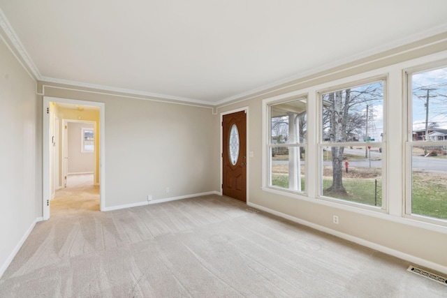 interior space with crown molding