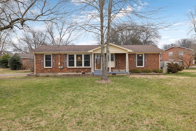 ranch-style house with a porch and a front yard