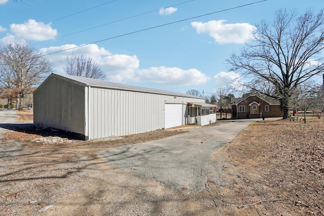 view of outdoor structure featuring a garage