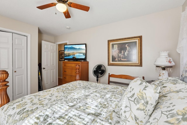 bedroom with ceiling fan and a closet